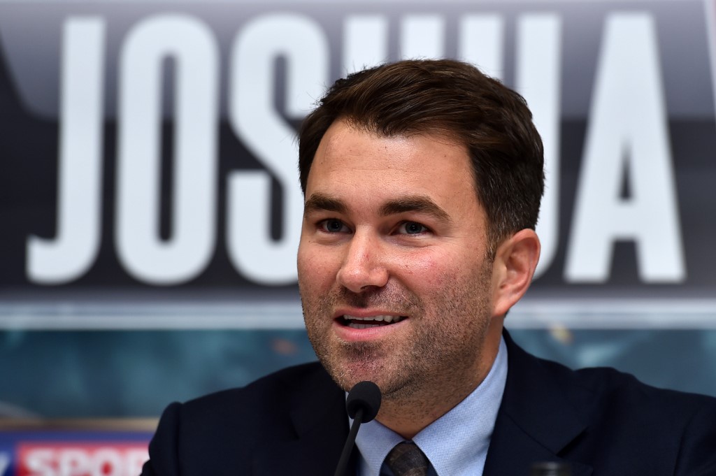 Boxing promoter Eddie Hearn speaks during a press conference for the coming IBF World Heavyweight fight between Anthony Joshua and Dominic Breazeale, in west London on May 4, 2016. - Joshua, makes the first defence of his IBF Heavyweight World Championship against undefeated American challenger Dominic Breazeale in London on June 25, 2016. (Photo by BEN STANSALL / AFP)